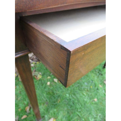 77 - A mahogany side table, having a wavy edge, with frieze drawer, width 33ins x 23ins, height 25ins