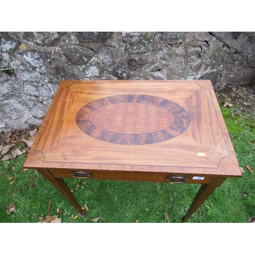 80 - An Edwardian mahogany table, fitted frieze drawer, having inlaid and cross banded decoration, raised... 