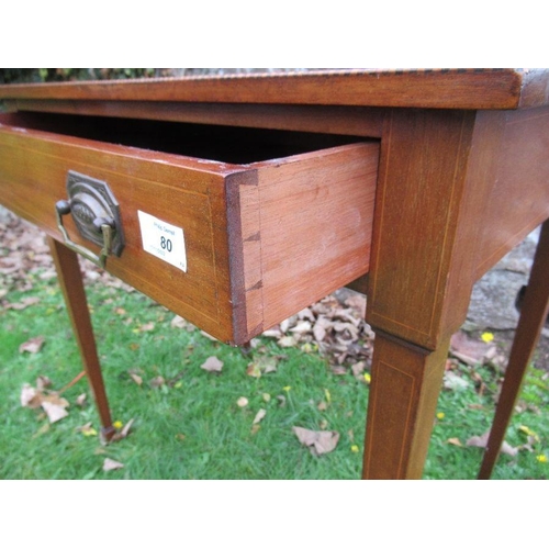 80 - An Edwardian mahogany table, fitted frieze drawer, having inlaid and cross banded decoration, raised... 