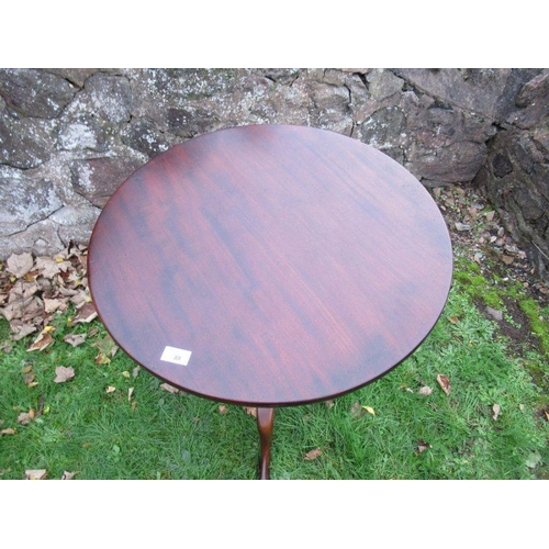 88 - A 19th century mahogany tripod table, with bird cage action, diameter 25ins, height 28ins