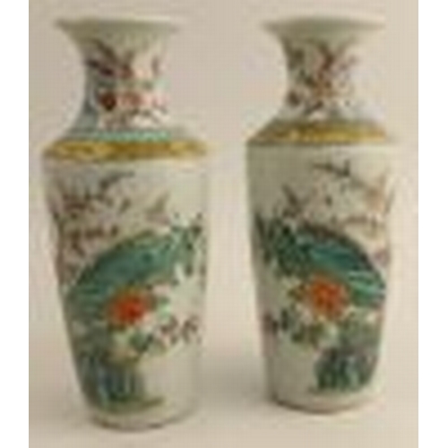 491 - A pair of 19th century famille rose vases, decorated with an egret on rock, one af, height 10ins - O... 