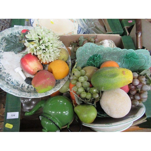 104 - A box of sundries, to include china and model fruit