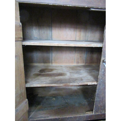 71 - A large pine cupboard, in distressed condition, width 60ins, depth 20ins, height 72ins