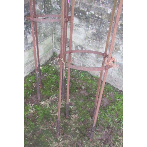 76 - Two metal obelisks