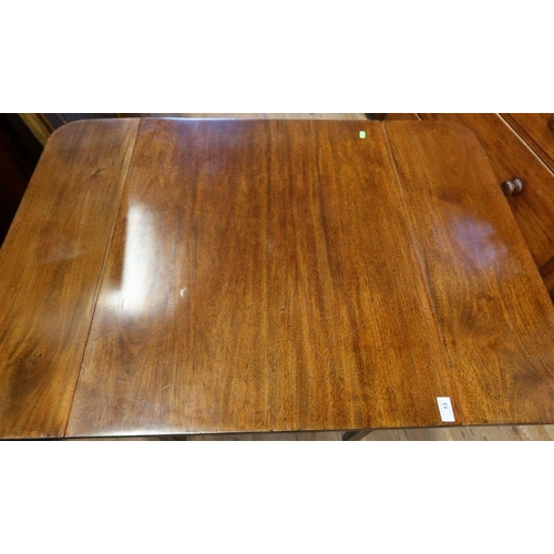 13 - A mahogany drop flap table, on square fluted legs united by a X stretcher, 43ins x 30ins, height 30i... 