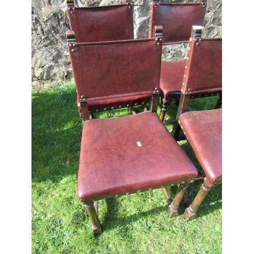 19 - Set of four 17th century design oak and leather dining chairs