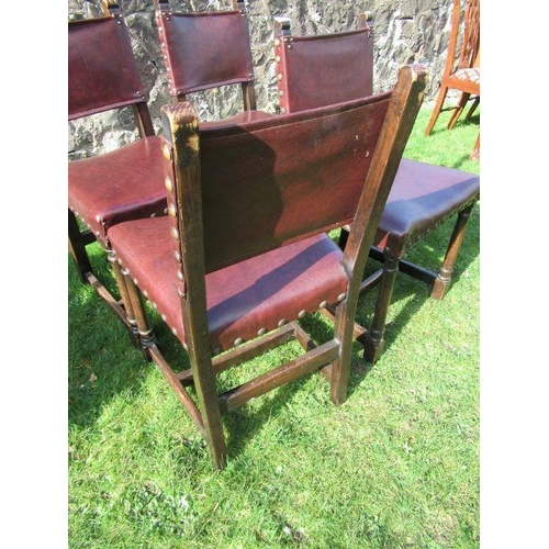 19 - Set of four 17th century design oak and leather dining chairs