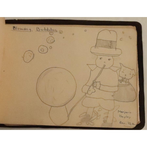 190 - A 1920's autograph sketch book, containing drawings and verses