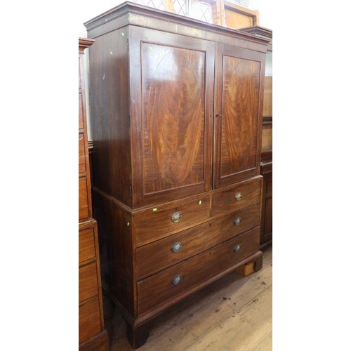 2 - A 19th century mahogany linen press, the upper section having a pair of fielded doors opening to rev... 