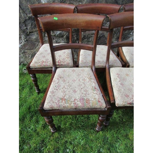 21 - A set of five Regency style mahogany bar backed dining chairs