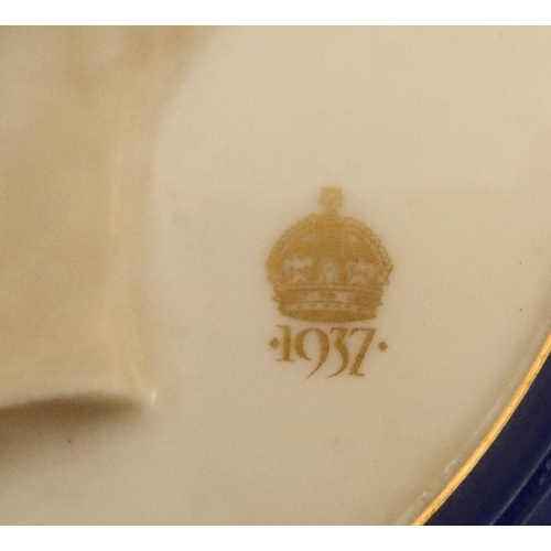 217 - Of Political interest -  Two Royal Worcester circular plaques, by Richard Carbe, George VI and Stanl... 