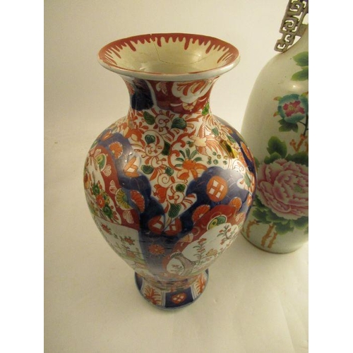 556 - A large 19th century Chinese vase decorated with flowers and script height 23