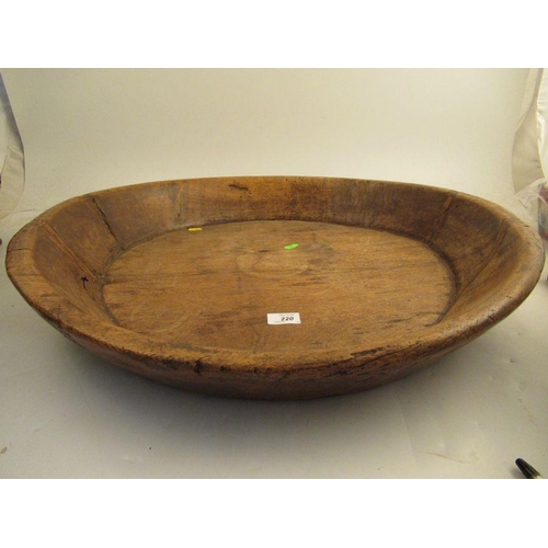 220 - A large circular wooden shallow bowl diameter 25 1/2