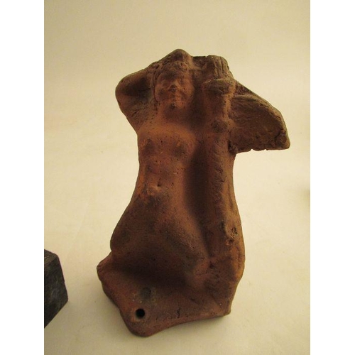 231 - A clay model of a female torso, attributed to Karin Jonzen, with her hands behind her head raised on... 