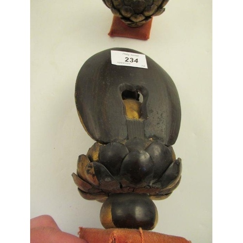 234 - A pair of carved Eastern sconces of seated  praying figures  within an arbor height 8 1/2