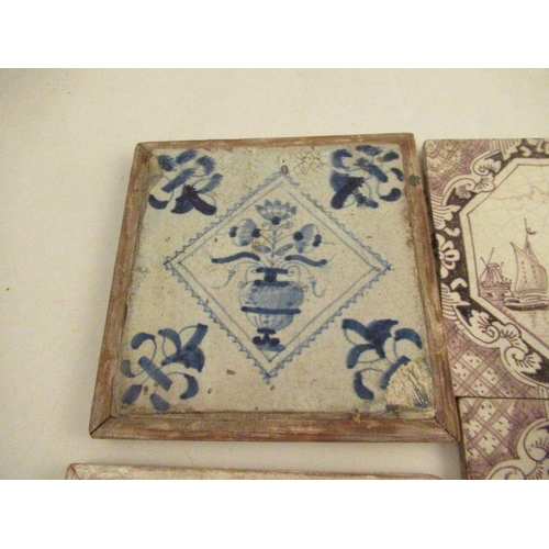 235 - 9 various tiles in magenta decorated with landscape scenes together with blue and white Delph tile a... 