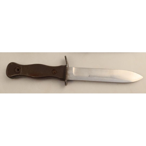 252 - A Bundeswehr M1968 German Army combat knife, the blade stamped Solingen Rostfrei 69, with metal scab... 