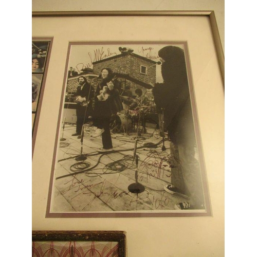 253 - A framed photograph of The Beatles ,together with a signed photograph including a sketch by John Len... 