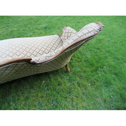 29 - A Victorian chaise longue, with shaped button back