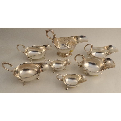 294 - An 18th century design silver plated sauce boat, together with three pairs of silver plated sauce bo... 