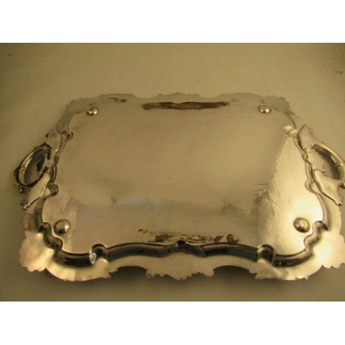 302 - An Irish Sheffield plated tray  with a central armorial of 3 boars heads with the moto 