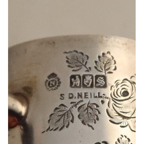 316 - An Irish silver mug, with engraved thistle, rose and shamrock decoration, Dublin 1913, weight 3oz, h... 