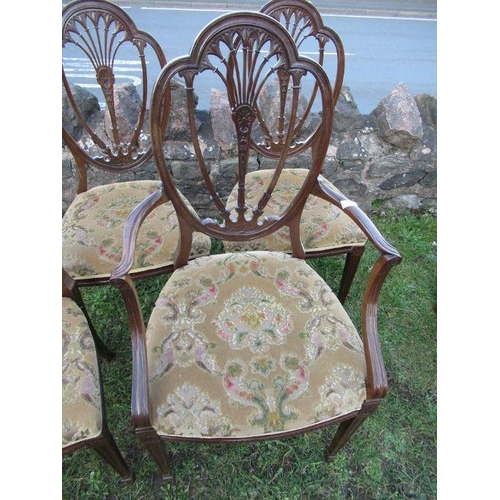 32 - A set of four dining chairs (3+1)