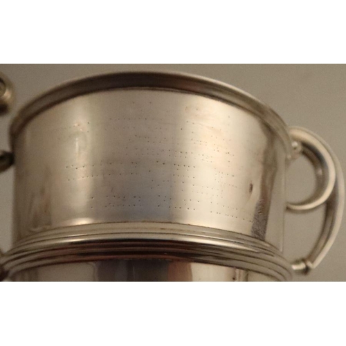 329 - A silver two handled trophy cup, inscription erased, Birmingham 1928, weight 9oz