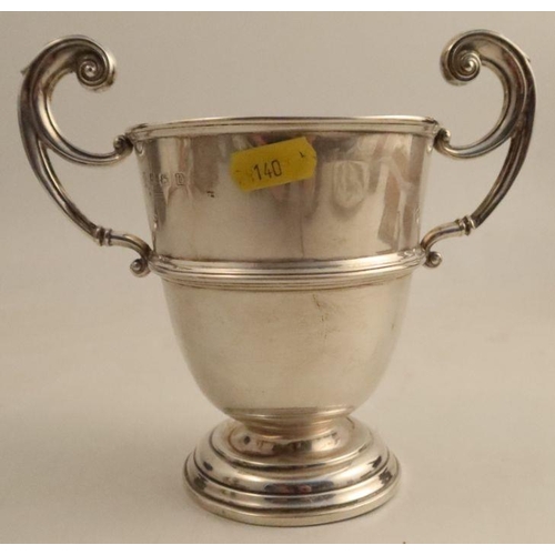 329 - A silver two handled trophy cup, inscription erased, Birmingham 1928, weight 9oz