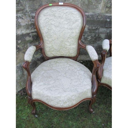 33 - A set of four Victorian show wood open arm chairs