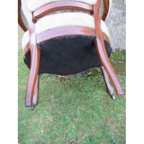 33 - A set of four Victorian show wood open arm chairs