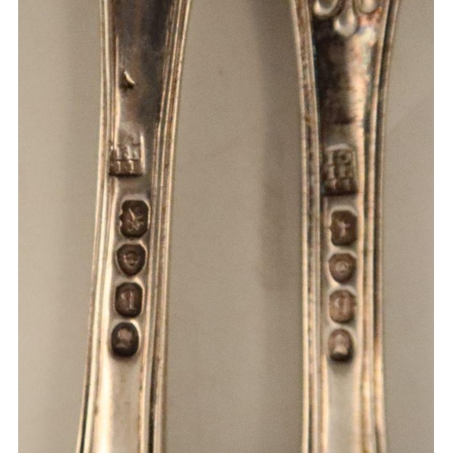 342 - A pair of Georgian silver kings pattern dinner forks, together with two other silver kings pattern f... 