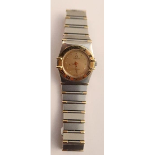 356 - A lady's Omega constellation stainless steel and 18ct yellow gold wrist watch, bracelet and deployme... 