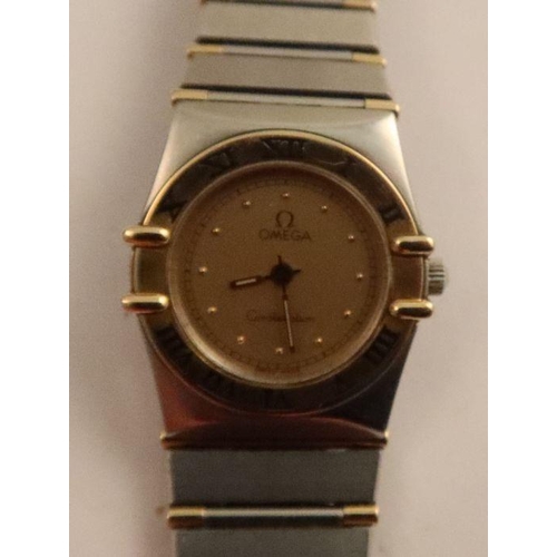 356 - A lady's Omega constellation stainless steel and 18ct yellow gold wrist watch, bracelet and deployme... 