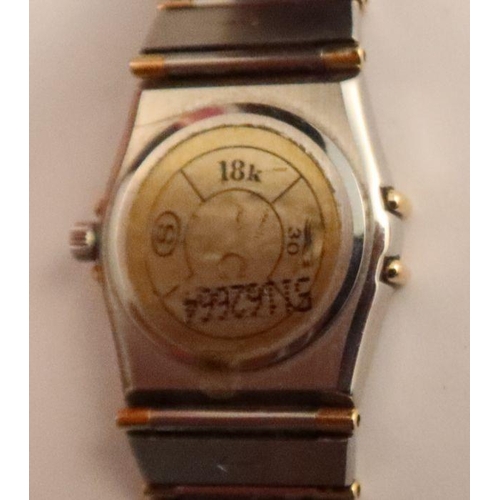 356 - A lady's Omega constellation stainless steel and 18ct yellow gold wrist watch, bracelet and deployme... 