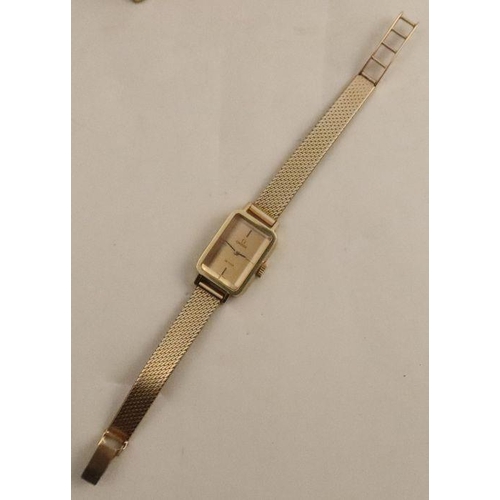 359 - A ladies Omega de Ville wrist watch, on a 9ct gold bracelet, in an Omega box