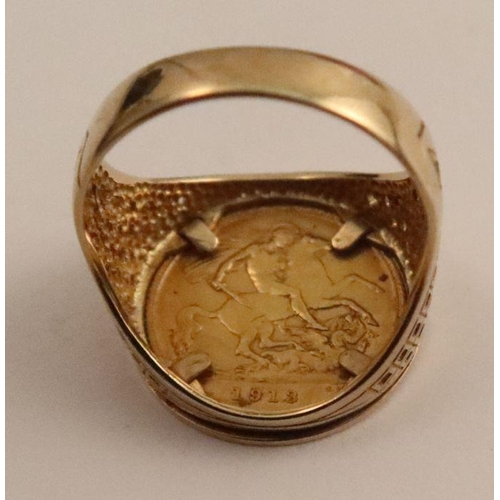 387 - A 9ct gold ring, set with a George V 1913 gold sovereign, with pierced trellis shoulders, hallmarked... 