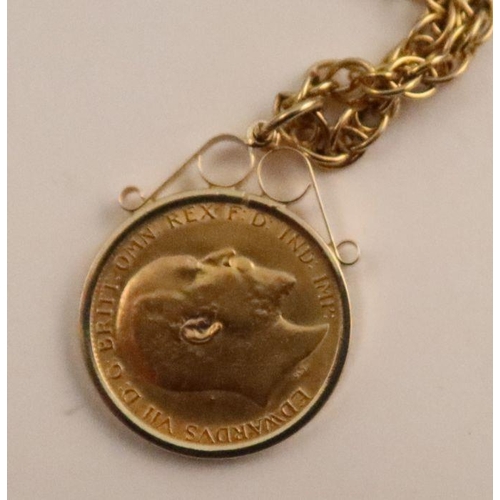 391 - An Edward VII half Sovereign, dated 1905, in a pendent mount, suspended on 9ct fancy link chain, gro... 