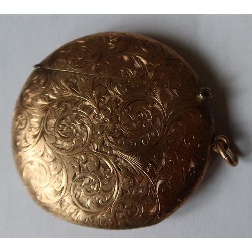 406 - A 9ct gold circular vesta case, with engraved decoration, weight 15g