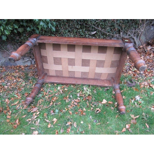 42 - A walnut framed foot stool, with a Waring & Gillows stamp, 21ins x 15ins,  together with a leather t... 