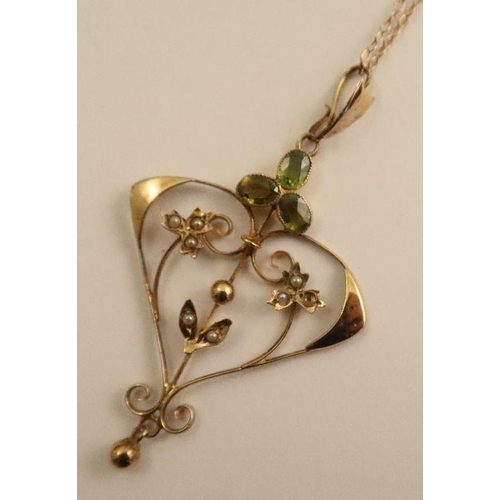 434 - A 9ct openwork pendent, set with a cluster of three oval cut peridot and pearls, stamped 9ct, suspen... 