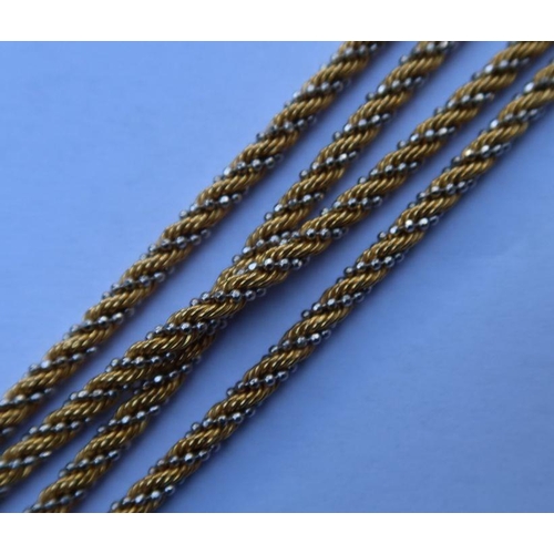 444 - An Italian gold two colour twist necklace, marked 750, weight 22g, length 32ins