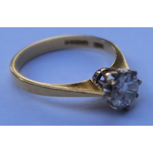 449 - An 18ct gold solitaire diamond ring, marked 750, approximately 0.9cts, weight 3.1g