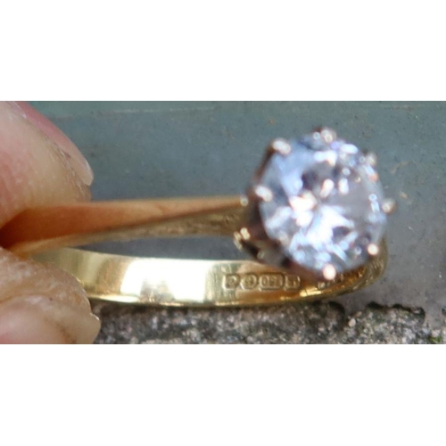 449 - An 18ct gold solitaire diamond ring, marked 750, approximately 0.9cts, weight 3.1g