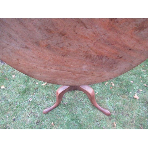 45 - A 19th century mahogany tilt top tripod table, diameter 34ins