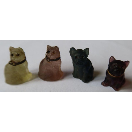 453 - Four coloured hardstone models, two of cats and two of dogs, height 2.3cm, together with a piquet wo... 