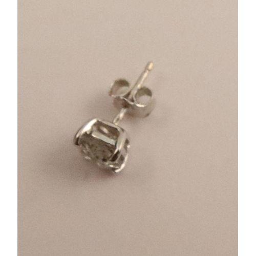 484 - A pair of diamond stud earrings, claw set in white gold, total weight of diamonds approx. 2.6cts