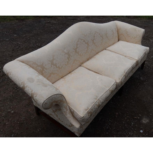 50 - A yellow three seater settee, with shaped back, raised on mahogany legs, with fire labels, length 84... 