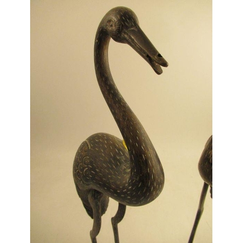 500 - A pair of brass models, of wading birds, height 23ins