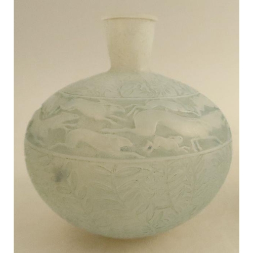 511 - Rene Lalique, an opalescent Lievres vase, decorated with a band of running hares, height 6.5ins